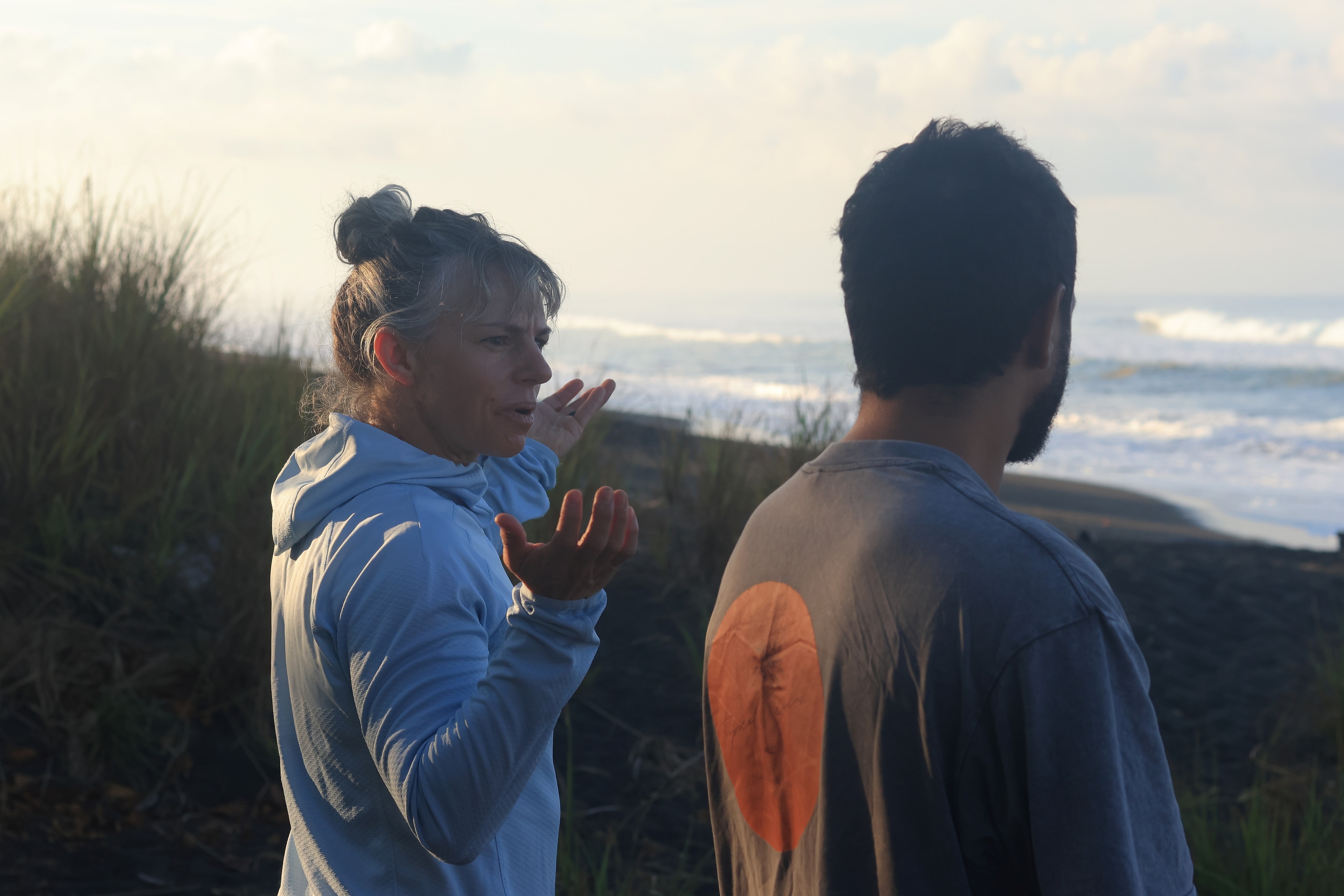 Surf instructor giving tips on the beach at Playa Hermosa
